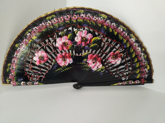 Black fan with pink flowers