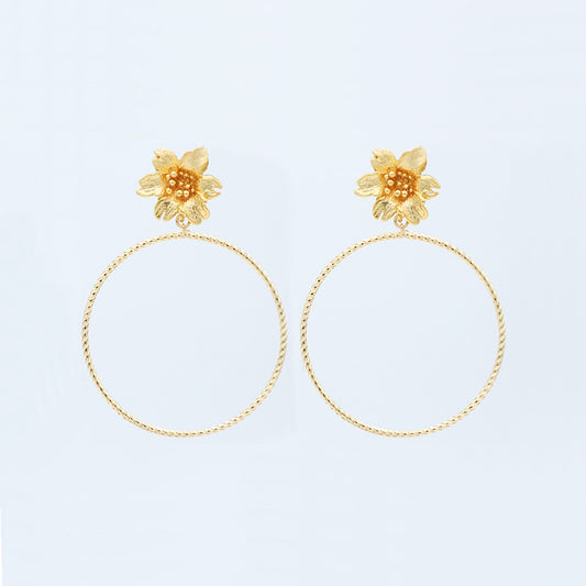 Gold braided flower grip earrings